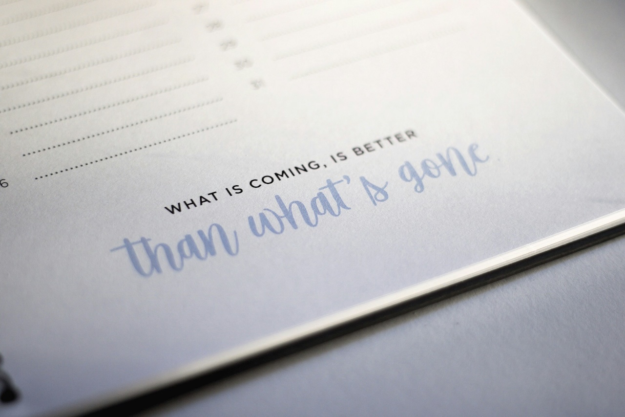 Words of wisdom, what is coming, is better than what's gone, sits on a table top reminding us to let the toxic relationship go.